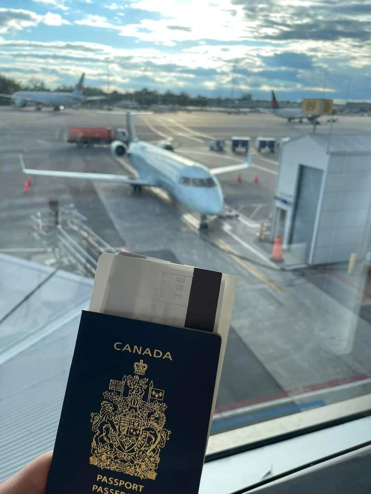 Canadian passport and travel papers in a journey setting